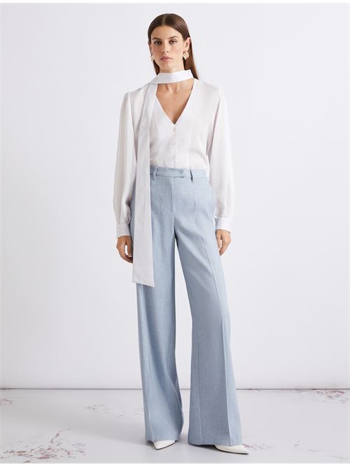 The reasons we love these palazzo trousers: their fluid fit, slimming cut and light linen and viscose fabric that sways with your every move. MARELLA | 2613131121200003